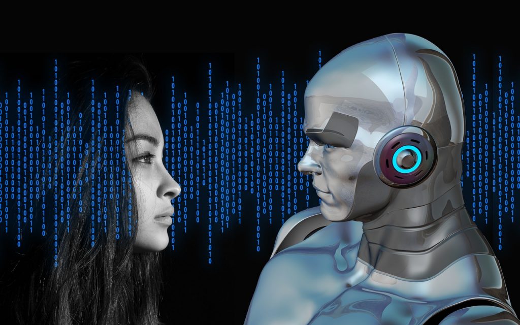 Sztuczna inteligencja, czyli science fiction w Twoim banku - twarz kobiety i robota na przeciwko siebie 