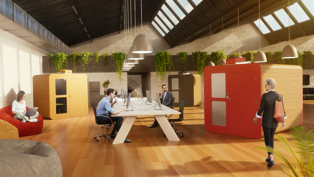Elastyczne powierzchnie biurowe – nowa potrzeba na rynku - ludzie w przestrzeni biurowej siedzą przy stole. 